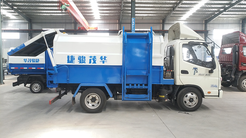 奥铃侧装垃圾车.jpg 奥铃侧装垃圾车.jpg